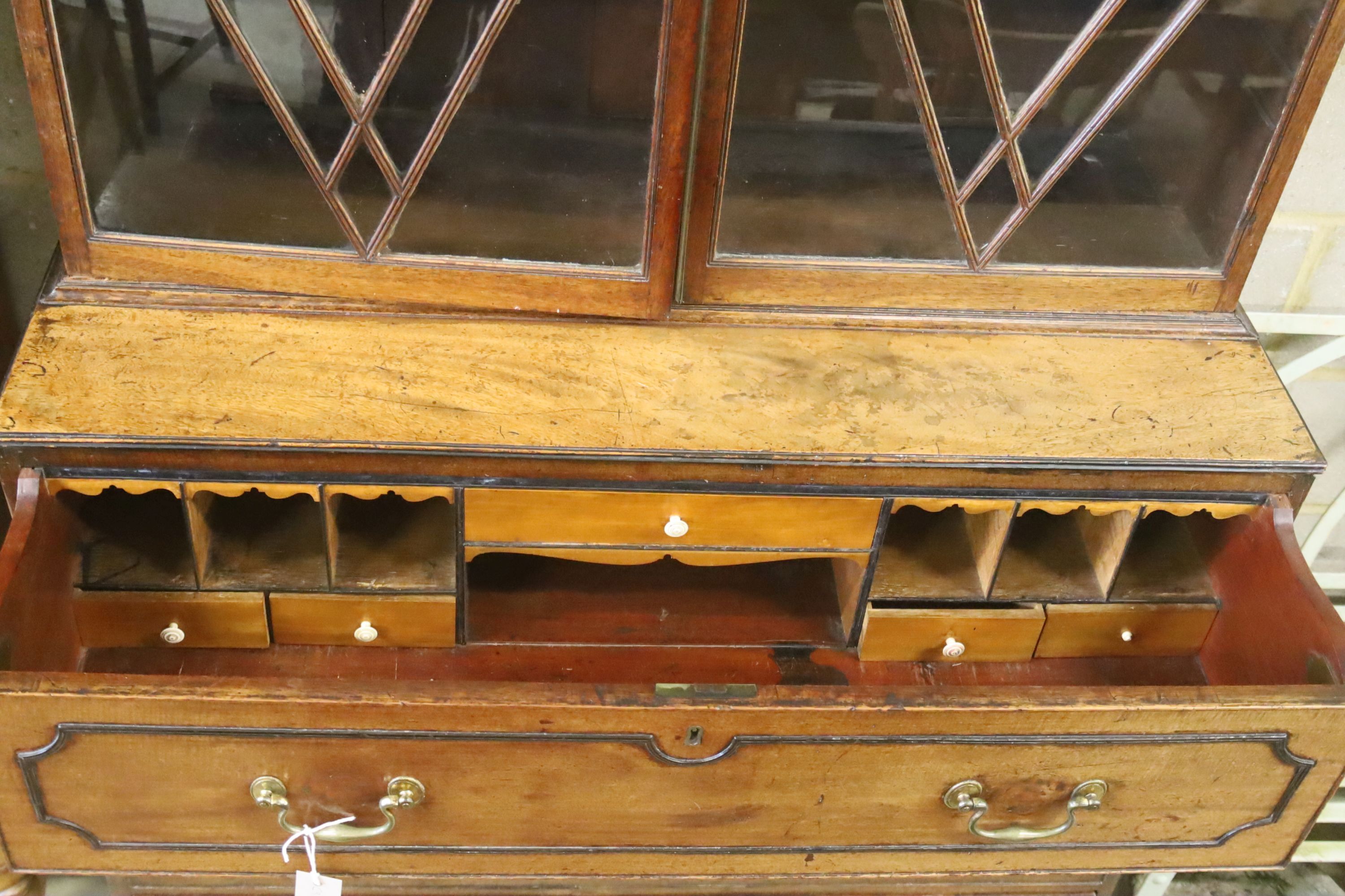 A Regency mahogany secretaire bookcase, length 107cm, depth 49cm, height 227cm